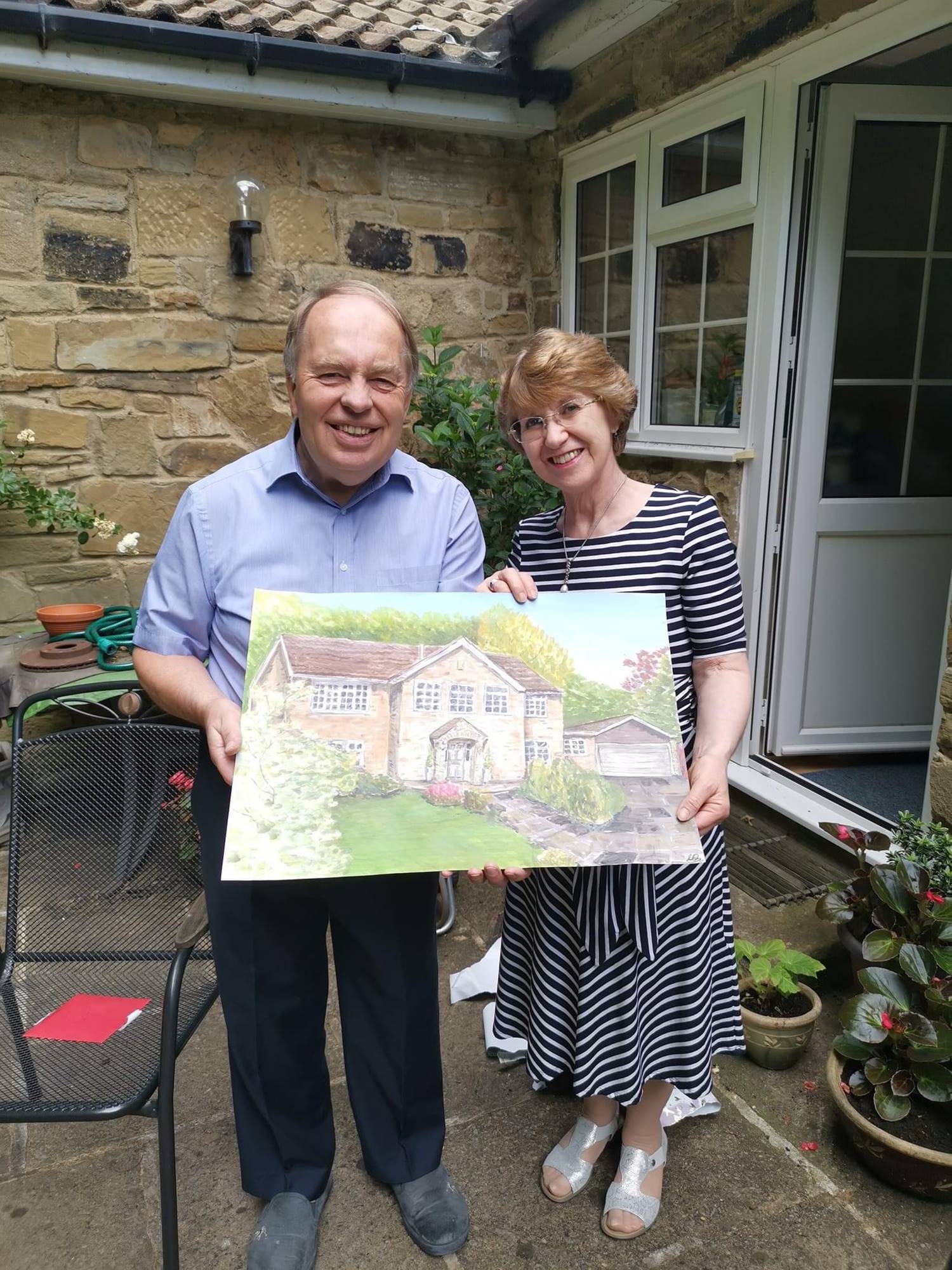 Clients with their comissioned painting
